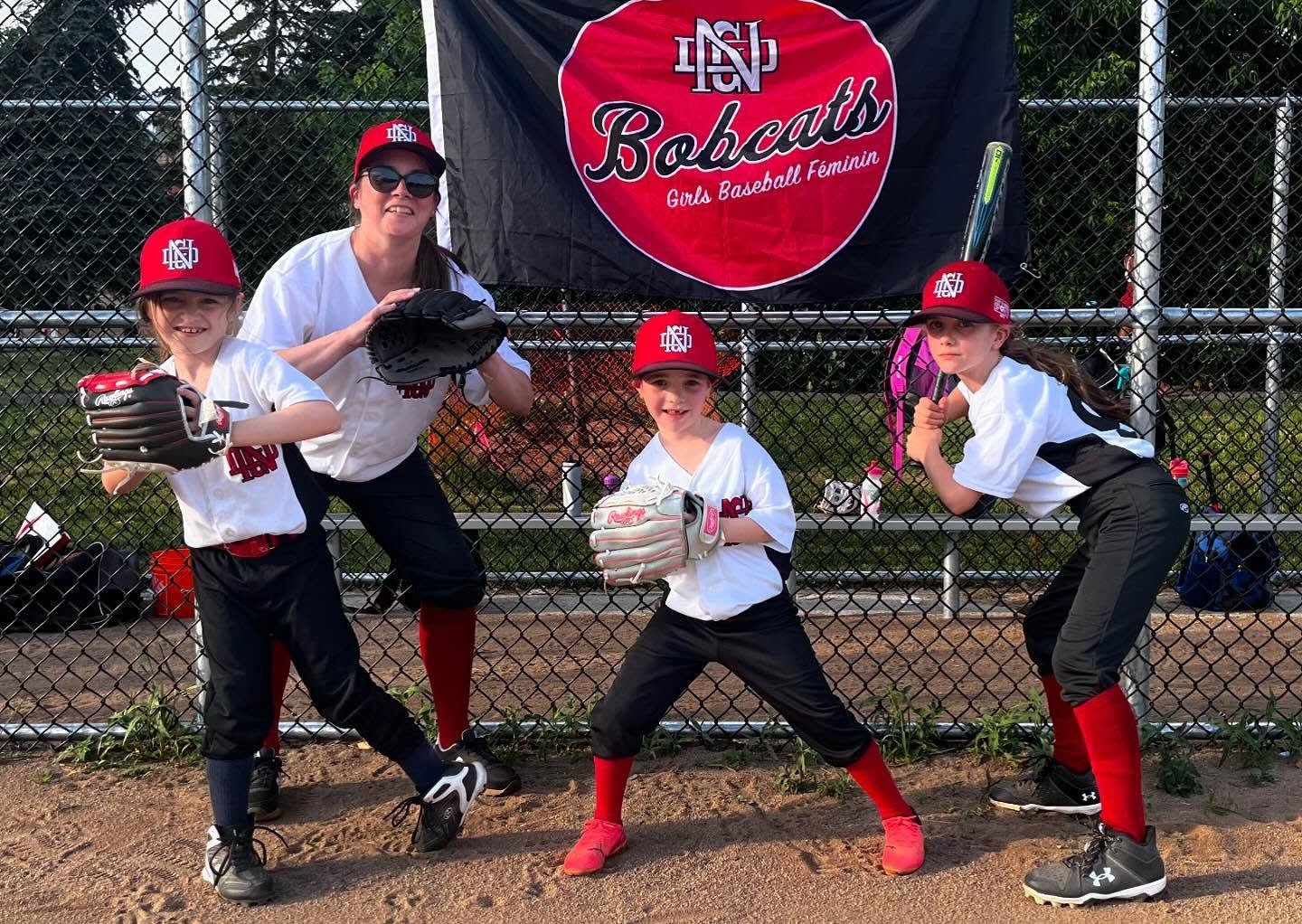 Bobcats baseball coach and players