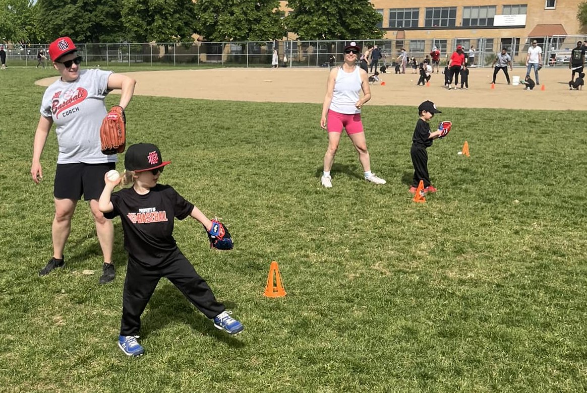 Orange Wildcat at bat